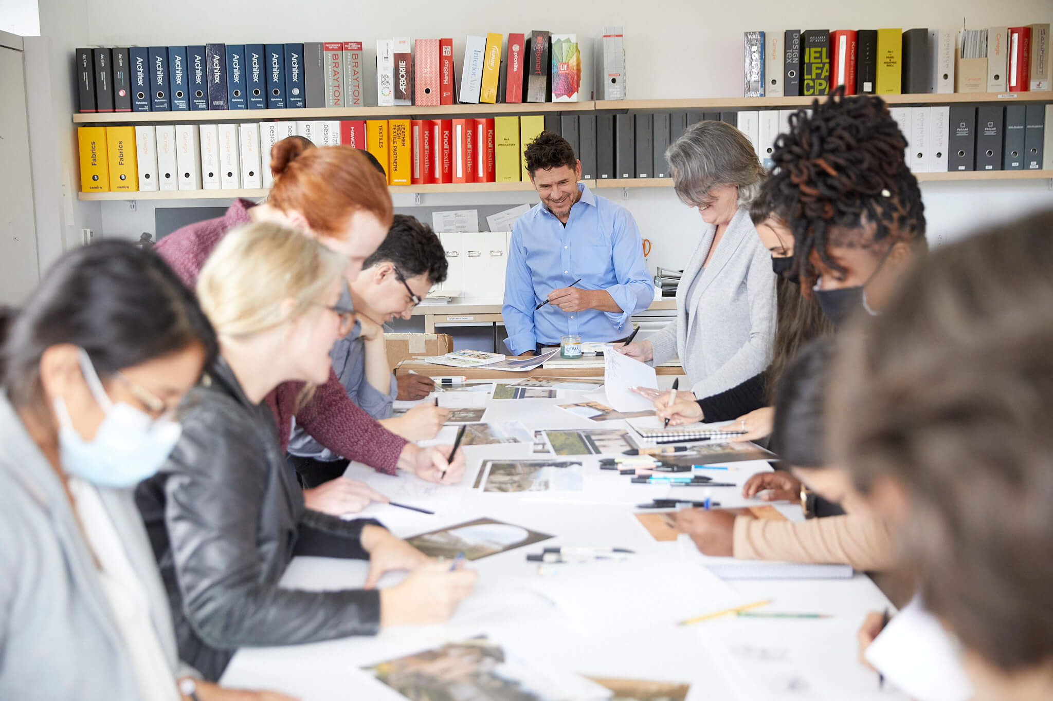 Large group working on sketching exercise